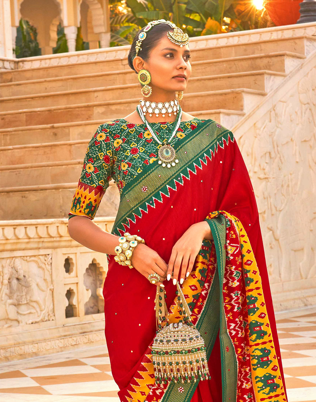 Bright Red and Green Patola Silk Mirror work Saree