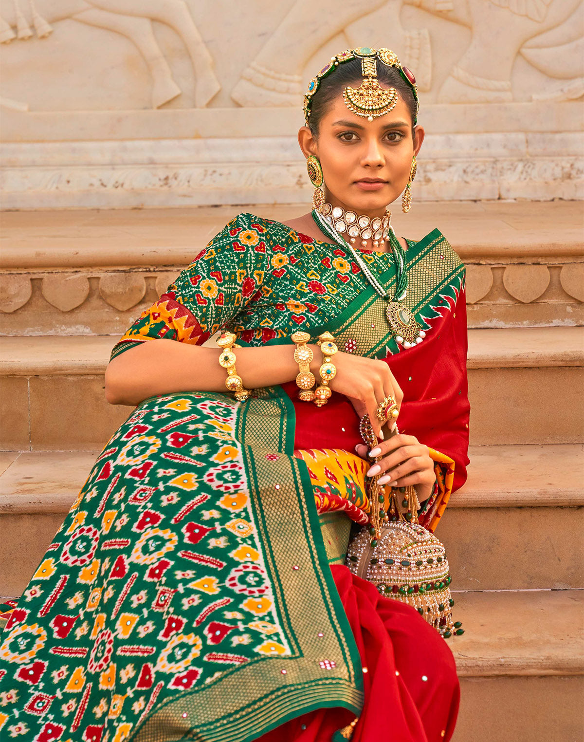 Bright Red and Green Patola Silk Mirror work Saree