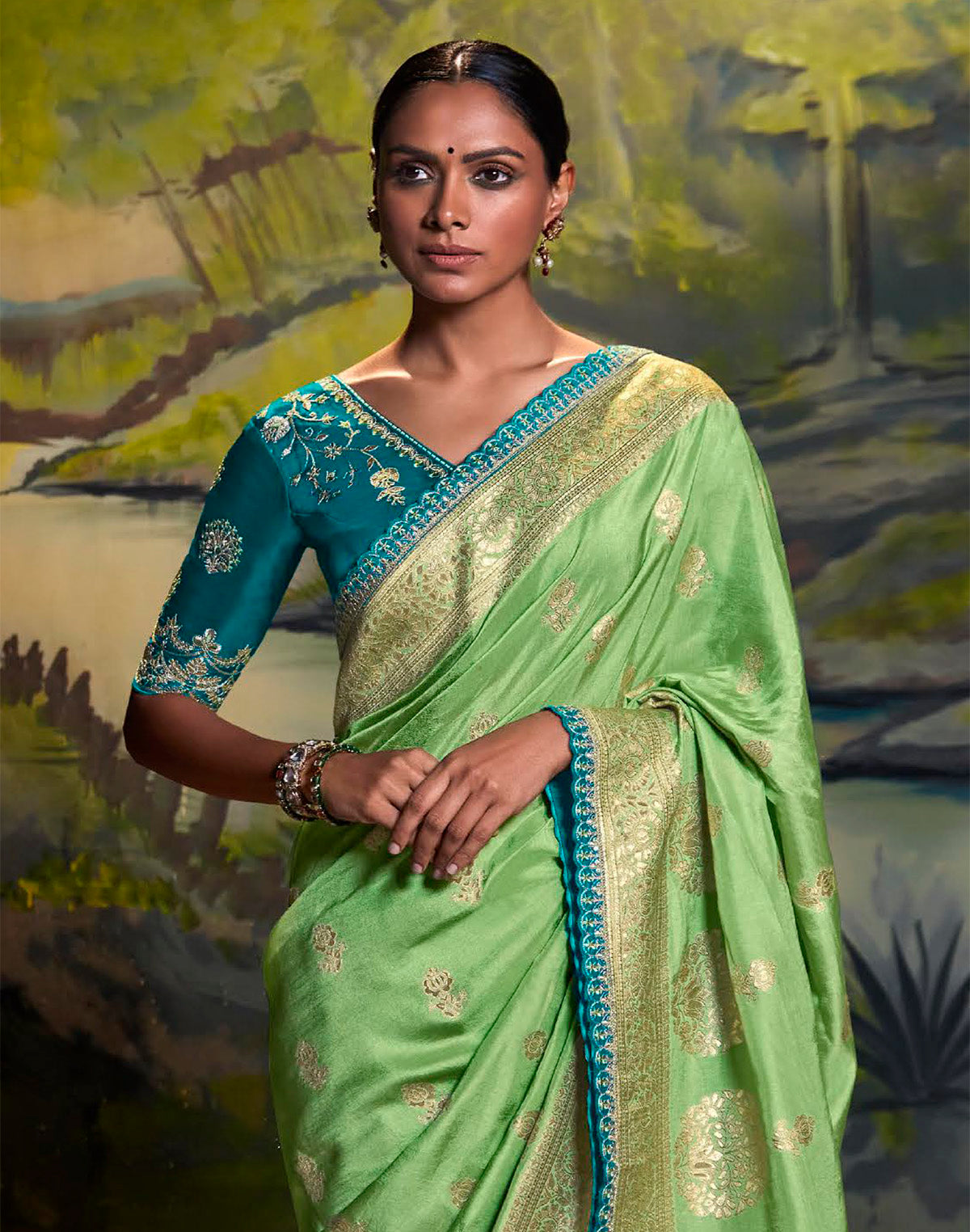 Pista Green Pure Dola Silk Saree With Designer blue Embroidery work Blouse