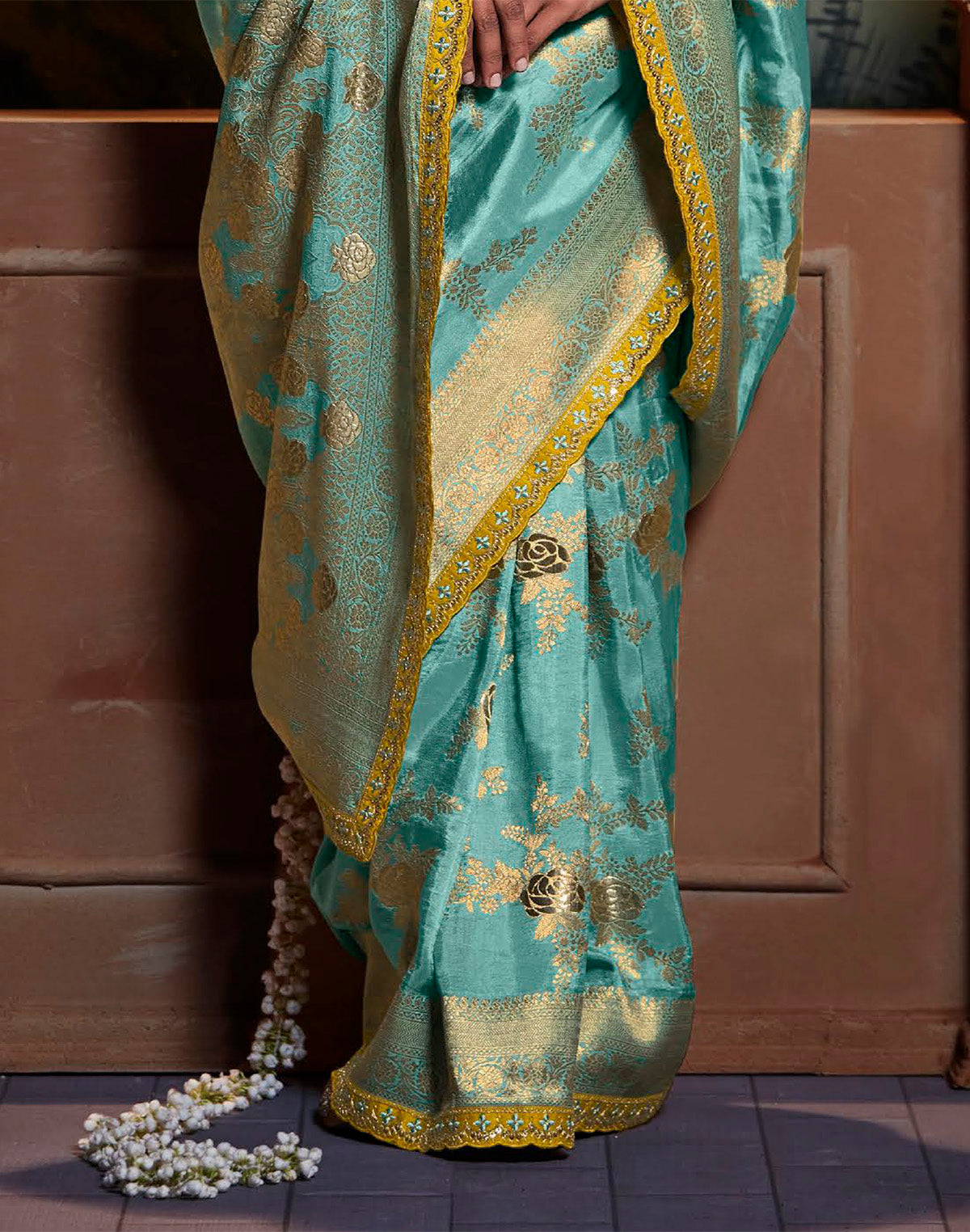 Aqua Blue Pure Dola Silk Floral Saree with Fancy Lace Border and Embroidery Work Blouse