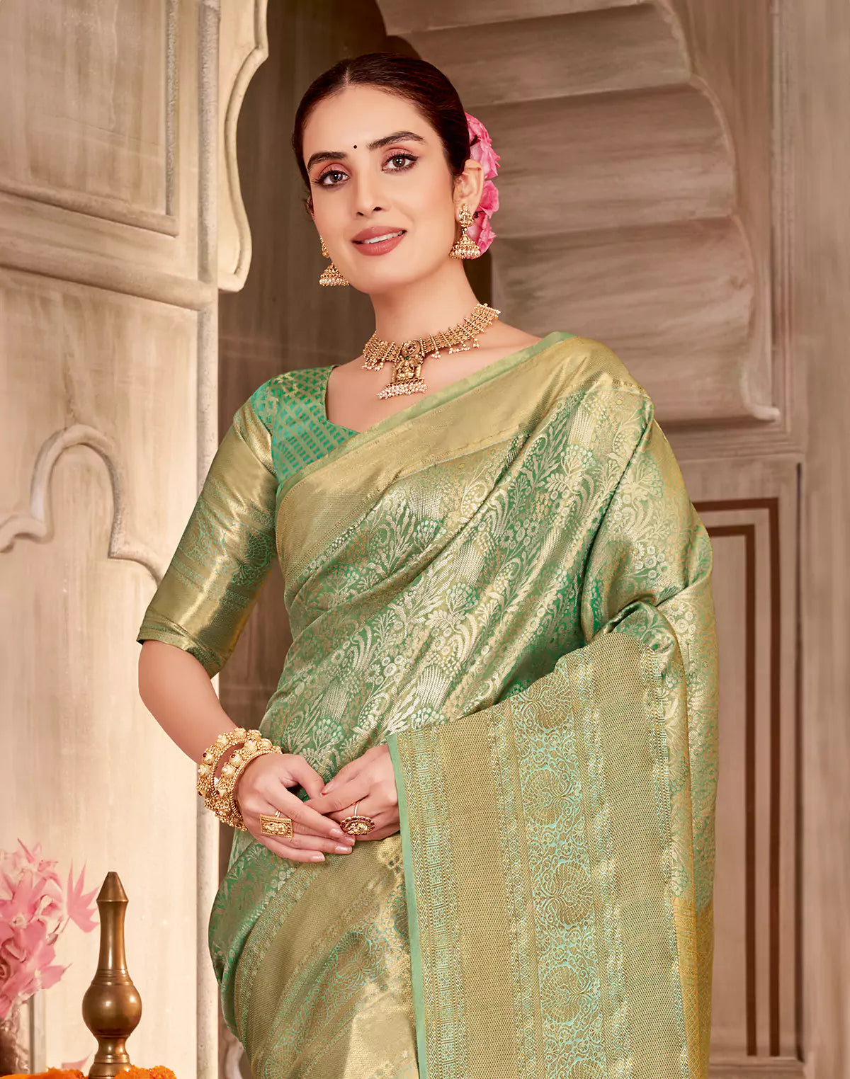 Sea Green Semi Silk Tissue Floral Theme Design Self Saree