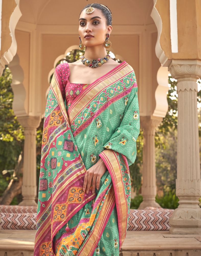 Patola Fabric Ligh Green Ikat Mirror work Saree
