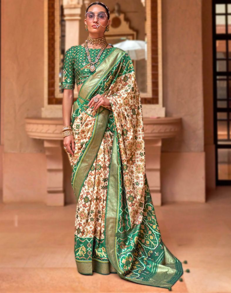 Attractive Gorgeous Off White Ikat Print Patola Saree