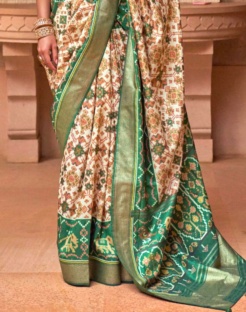 Attractive Gorgeous Off White Ikat Print Patola Saree