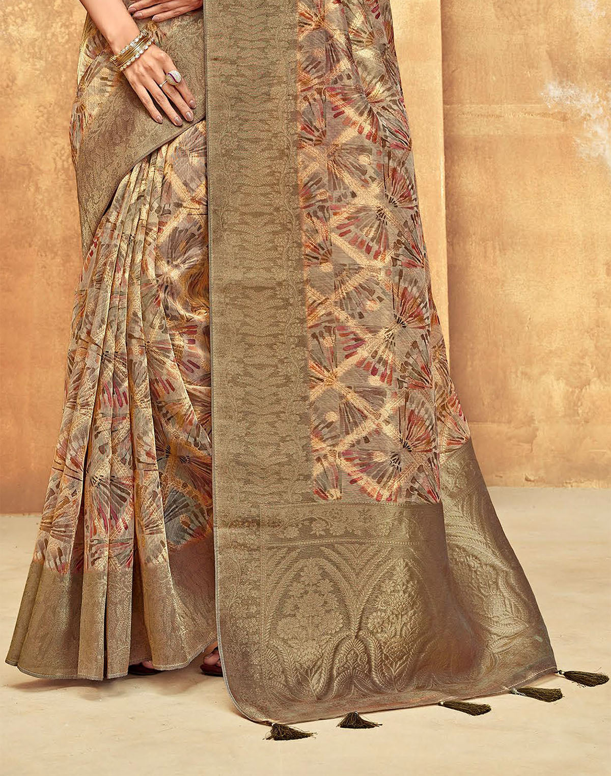 Beige Graphic design Organza Saree with Tussels