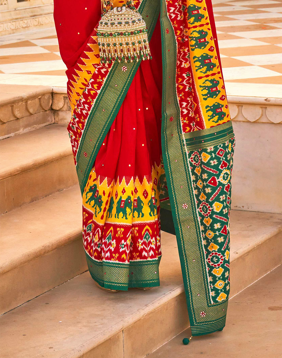 Bright Red and Green Patola Silk Mirror work Saree