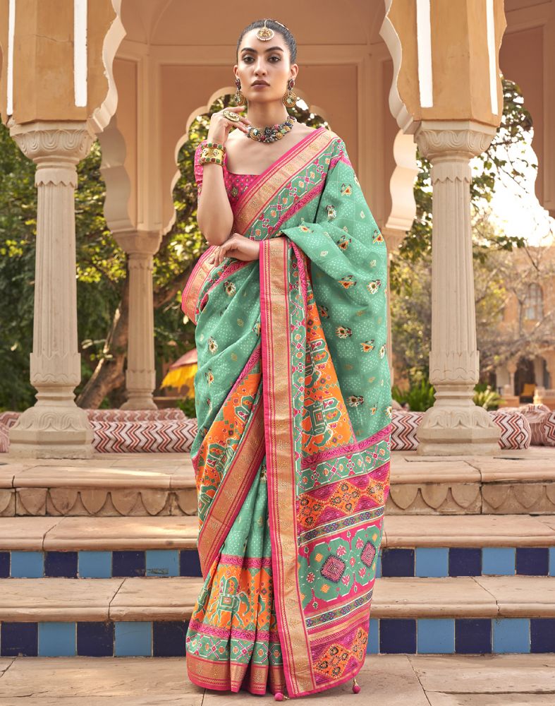 Patola Fabric Ligh Green Ikat Mirror work Saree