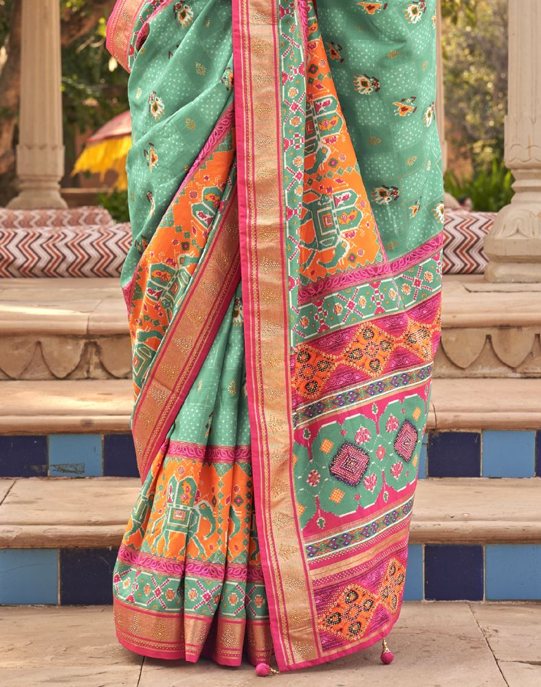 Patola Fabric Ligh Green Ikat Mirror work Saree