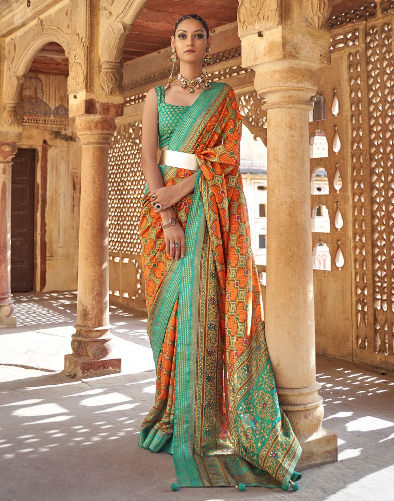 Fascinating Orange Geometric Print Patola Saree