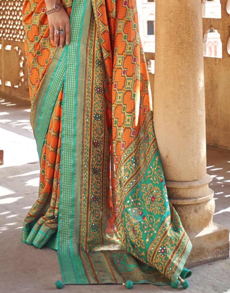 Fascinating Orange Geometric Print Patola Saree